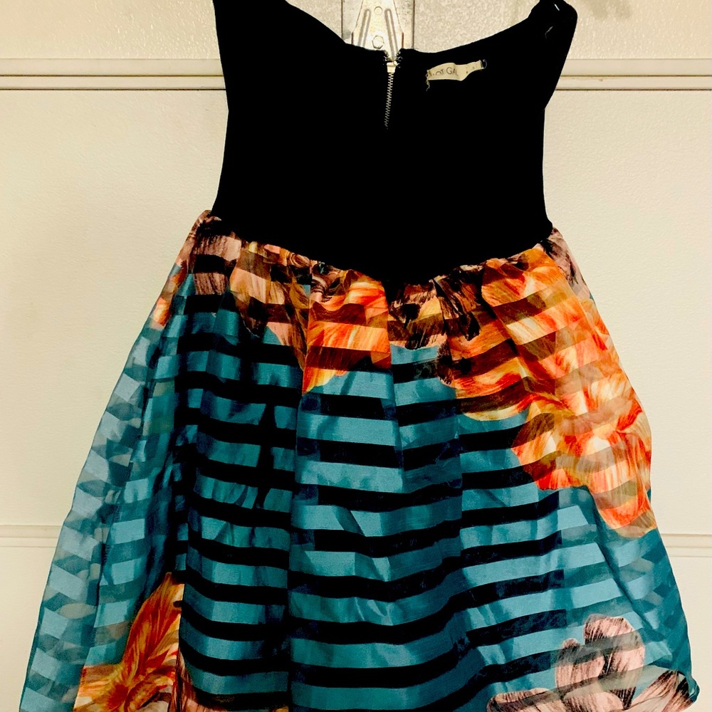 Worn once. cocktail dress , strapless heart shape top Short front long in back